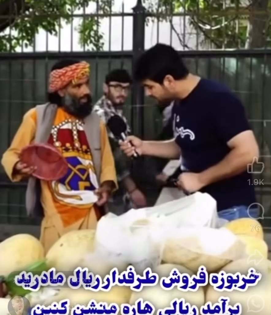 Guy made a traditional afghan clothing with real madrid emblem.