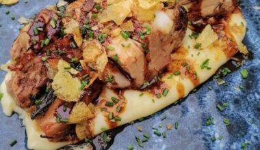 Pork Belly with apple cider gravy on mashed Potatoes
