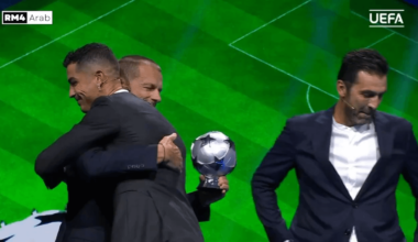 Ronaldo having a look at his award for being the all-time Champions League top scorer