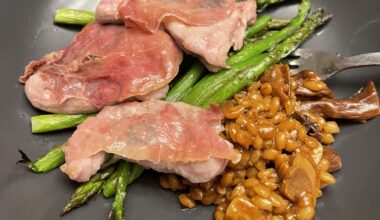 [🏴󠁧󠁢󠁥󠁮󠁧󠁿] my take on saltimbocca, with dried mushroom barley risotto and grilled asparagus