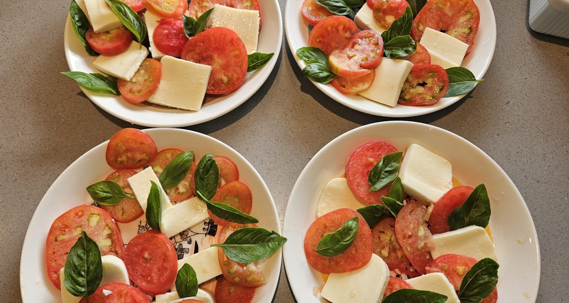 Tomatoes finally! Salad with home-grown tomatoes and basil... (cheese from Italy)
