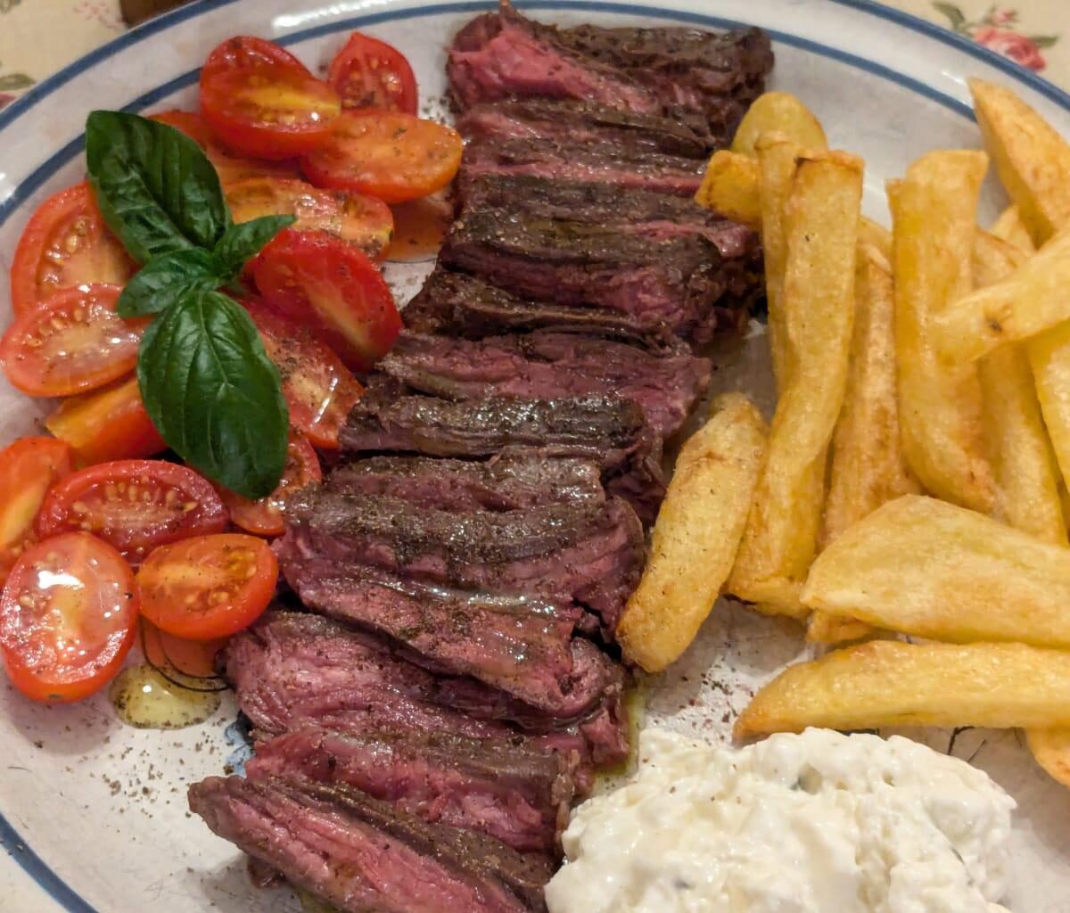 Skirt Steak, Homemade french fries, Tzatziki, Cherry tomatoes