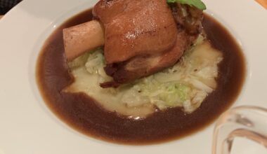 roast pork with mashed potato, buttered cabbage & gravy
