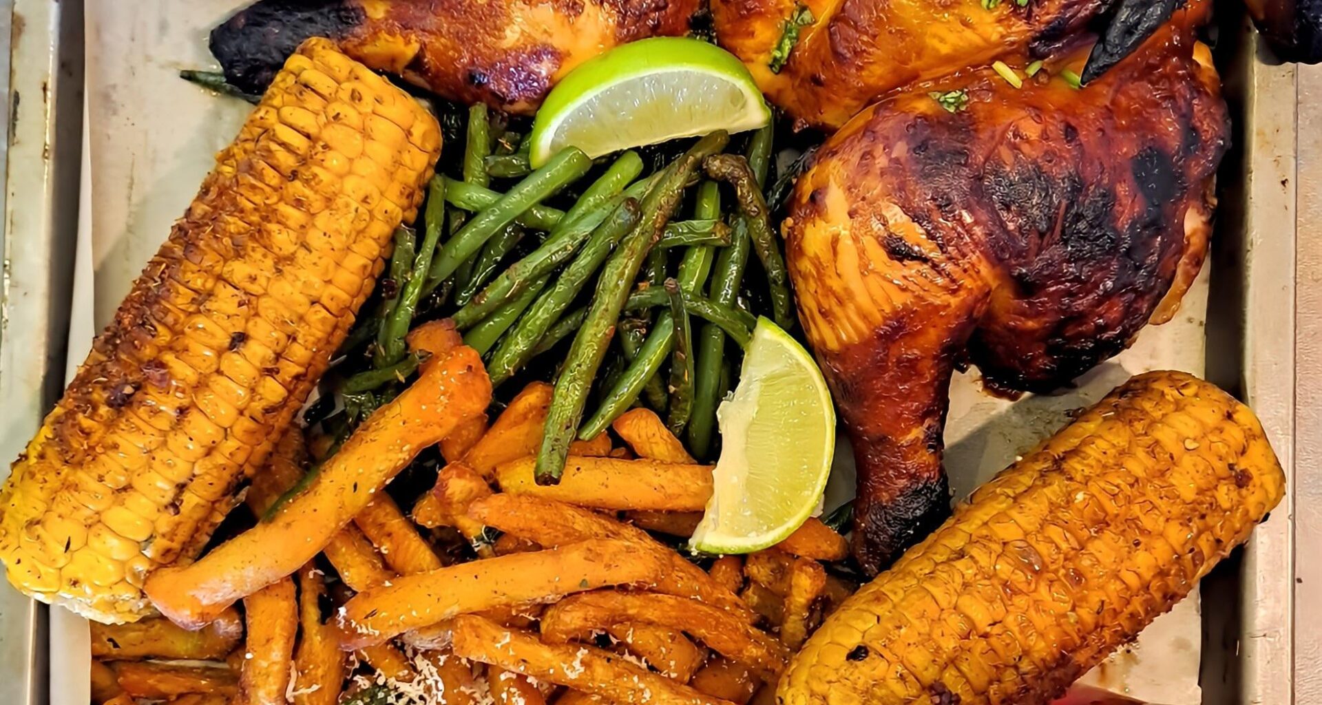 My attempt at a homemade Nandos. Piri-piri chicken with garlic and parmesan chips, greenbeans and corn