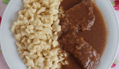 Even better reheated! Beef cutlets in red wine sauce with Nockerl (egg noodles).