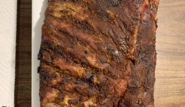 Backyard Smoky Delight: Home-Grilled Rack of Ribs