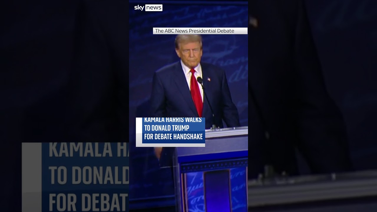Harris walks to Trump for handshake