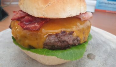 Homemade Wagyu Bacon Cheeseburger with black truffle sauce