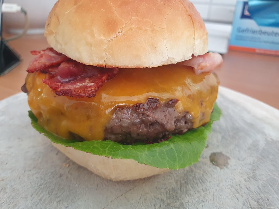 Homemade Wagyu Bacon Cheeseburger with black truffle sauce