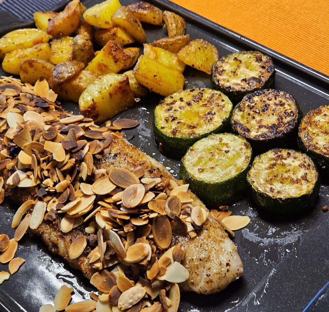 It's getting colder here: Zander with roasted almonds, served with potato and courgette slices will do to combat the cool!