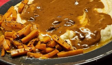 Meatballs in a creamy onion and bacon sauce, served with glazed caraway carrots and homemade mashed potatoes