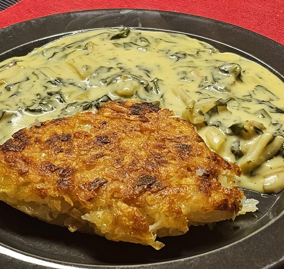 Homemade typical Swiss Rösti, with a large chard (mangold) found at the local farmer's stand (we actually bought two, the non-pictured one was red), at a creamy cheese sauce