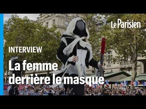 Masked stuntwoman at opening ceremony reveals her identity