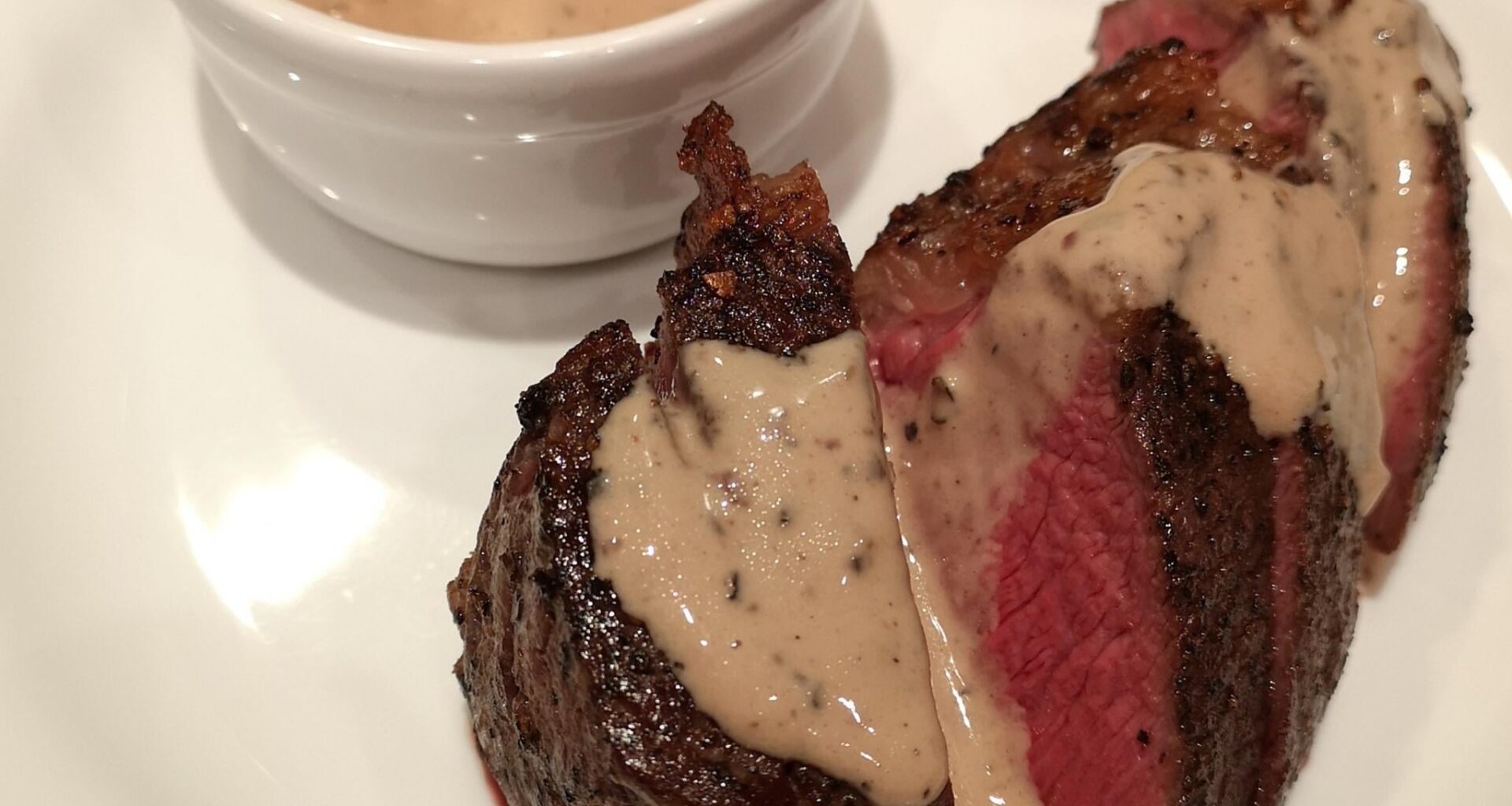 sous vide steak with homemade peppercorn sauce