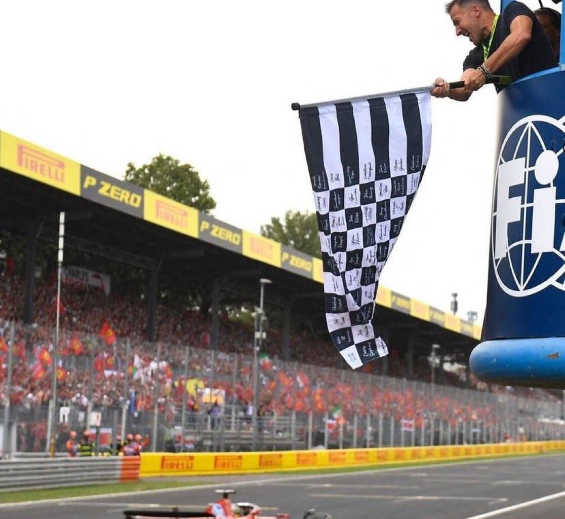 Alex Del Piero waving the chequered flag at the Italian Grand Prix as Charles Leclerc wins it for Ferrari!