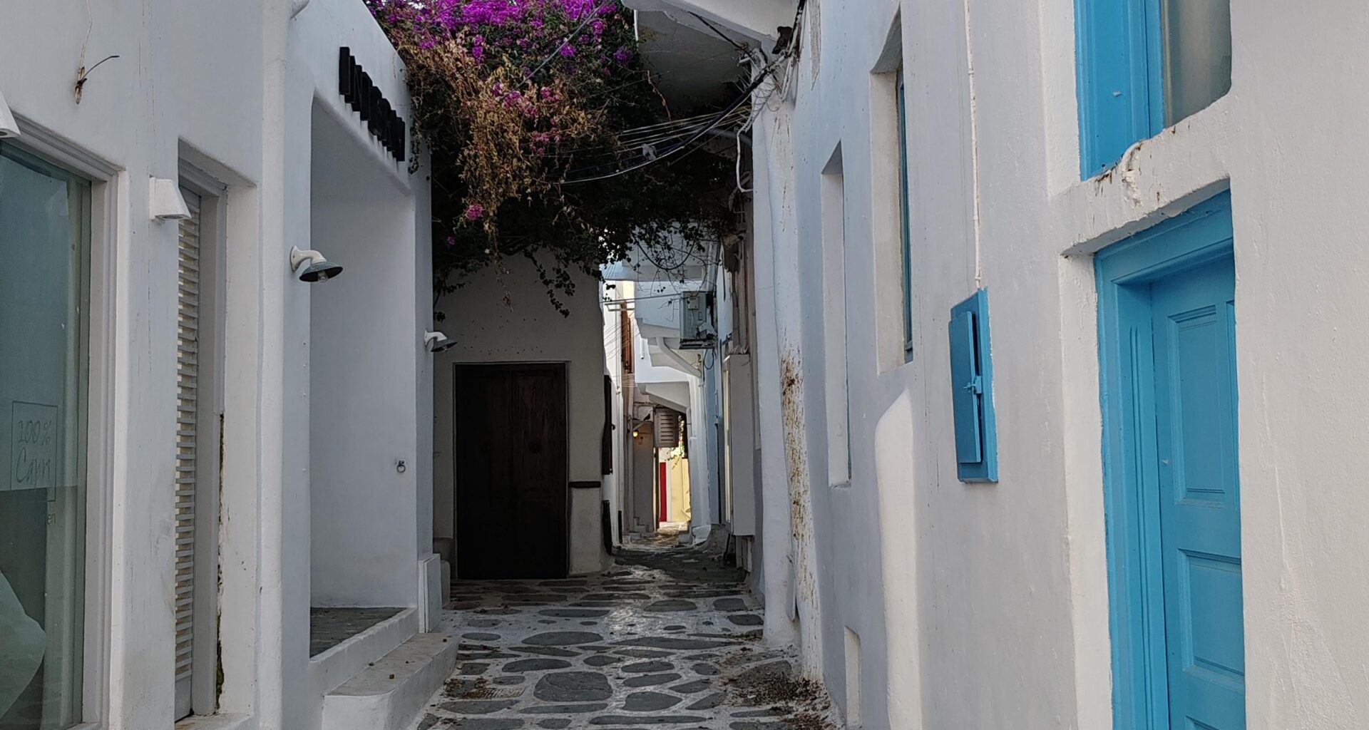 Mykonos,flower-shaded street.