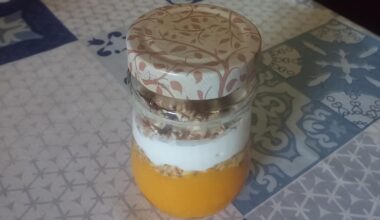 Peach compote with muesli, Greek yoghurt and more muesli