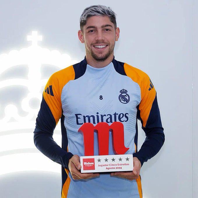 Fede Valverde posing with Real Madrid Player of The Month Award For The Month of August