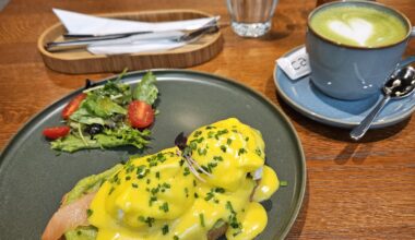 Egg Benedict with avocado and salmon and Matcha Latte in Plzeň, Czech Republic