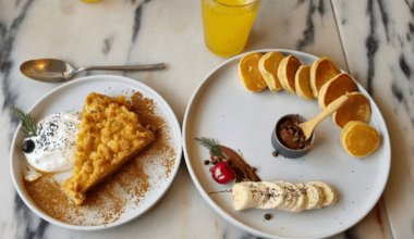 Brunch in Lisbon. Pancakes and apple crumble with greek yogurt