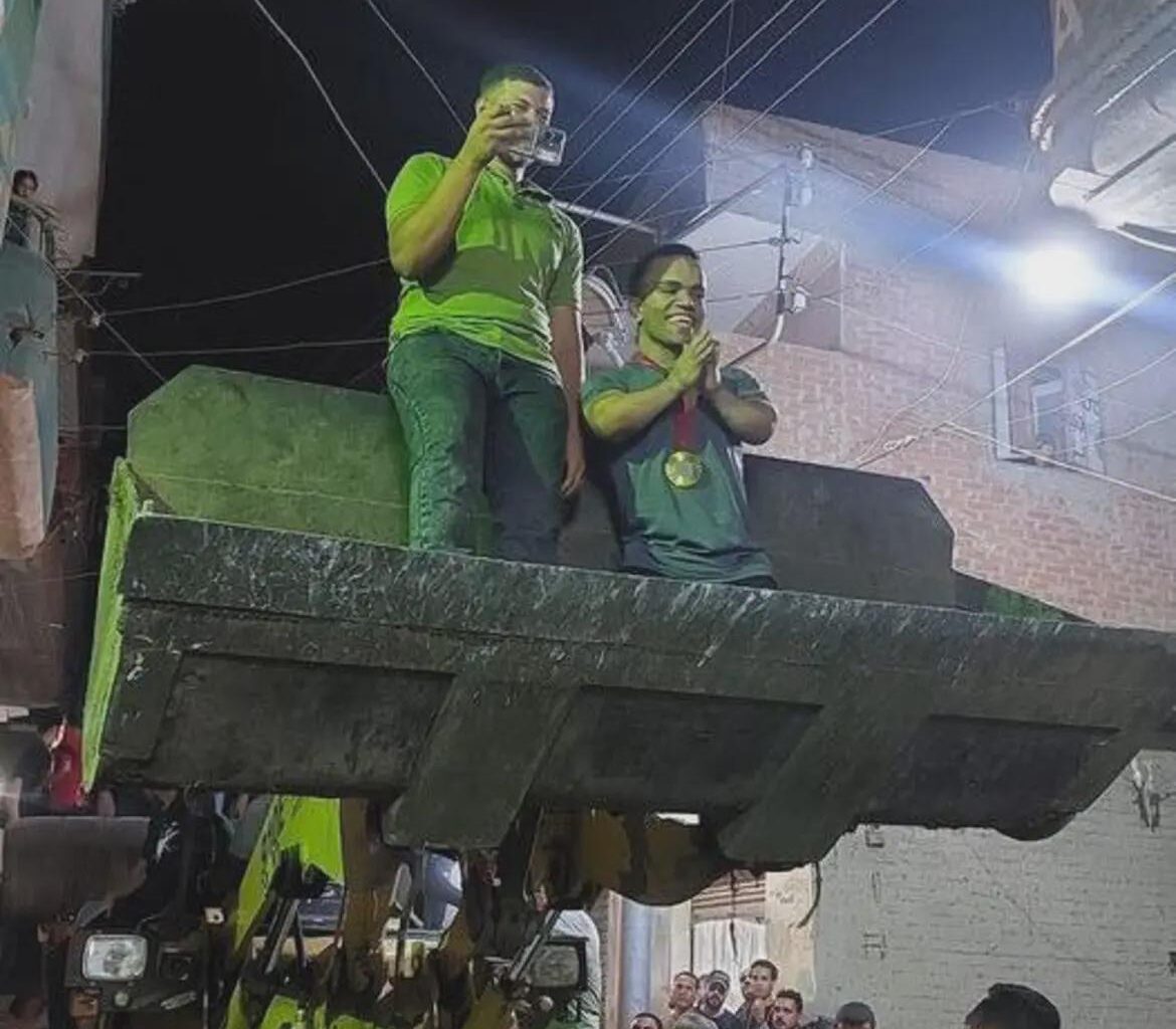 Mohamed El-Minyawis welcoming in his home village in Tanta, Egypt after winning gold in weightlifting
