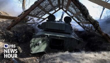 Ukrainians face painful choice of leaving or staying as Russian forces advance on town