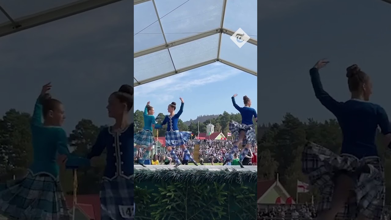 Competitors in action at the Braemar Gathering highland games