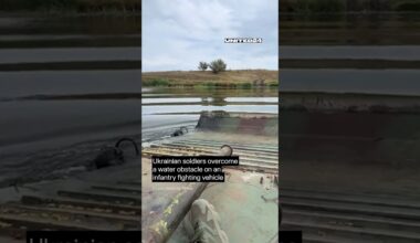 Ukrainian soldiers overcome a water obstacle on an infantry fighting vehicle #warinukraine #shorts