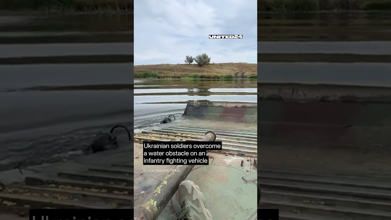 Ukrainian soldiers overcome a water obstacle on an infantry fighting vehicle #warinukraine #shorts
