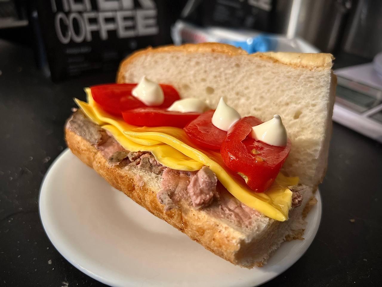 Pâté, cheese and tomato sandwich