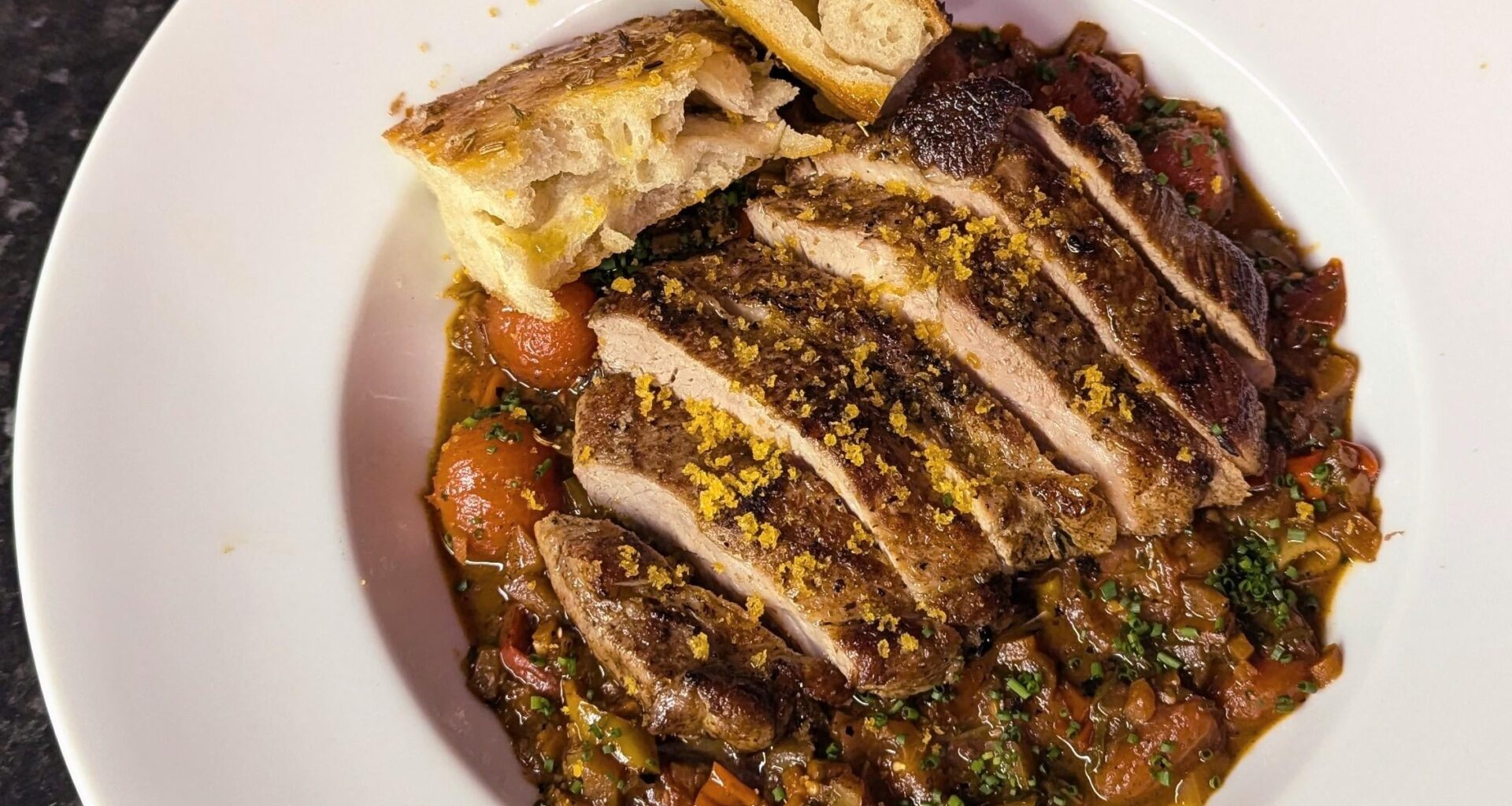 Local free range pork with homegrown tomatoes and peppers, focaccia and finished with some beautiful bottarga.