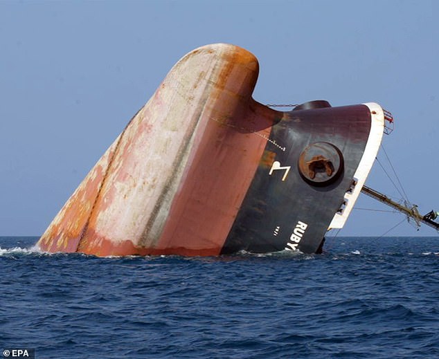 The last part of the British-registered cargo vessel, Rubymar, sinking in the Red Sea off the coast of Yemen, March 3