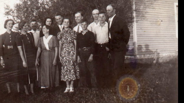 MaryJo Kacvinski's grandparents Steve and Mary and their ten children. MaryJo's dad, Joe, is second from the right.