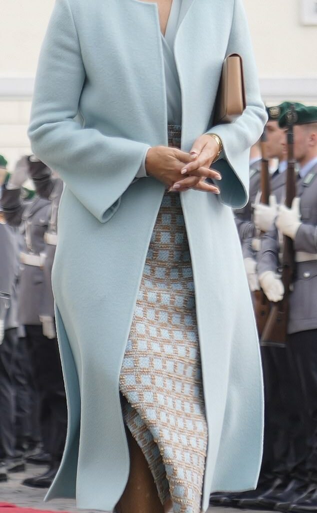Mary looked elegant in a powder blue outfit, which consisted of soft, longline coat and matching blouse by Jesper Hovring