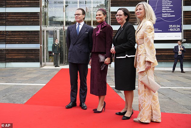 The Swedish royals posed outside the Pan Nordic Building - or 'Felleshus' - which was inaugurated by the former Queen of Denmark, Margarethe II, in 1999