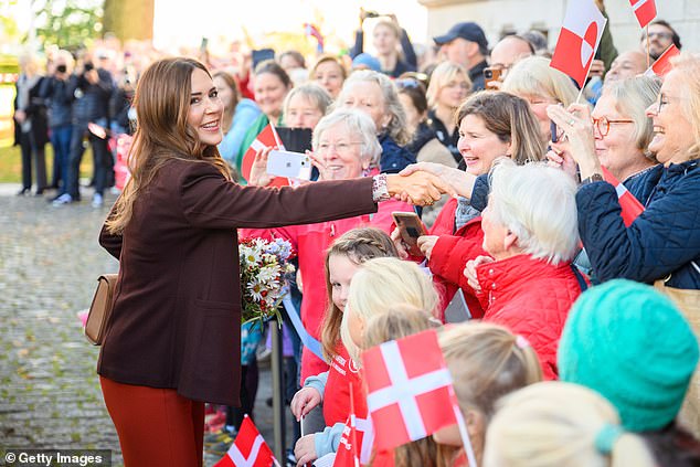 The 52-year-old royal greeted fans waving Danish flags upon her arrival