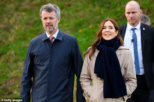 Frederik also wrapped up while he and Mary were outside. He added a navy blue jacket over his smart suit
