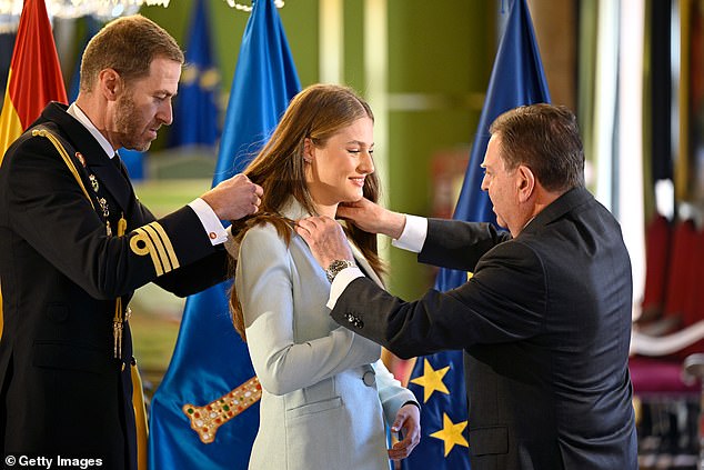 The 18-year-old Spanish royal smiled as Mayor Alfredo Canteli awarded her the title on Thursday