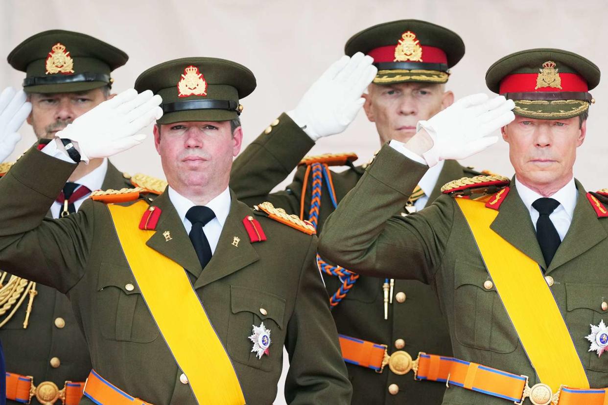 <p>Sylvain Lefevre/Getty</p> Prince Guillaume and Grand Duke Henri attend the military parade of National Day on June 23, 2022 in Luxembourg