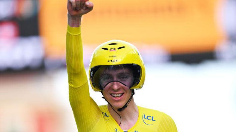 Tadej Pogacar of UAE Team Emirates crosses the finish line during the 2024 Tour de France.
