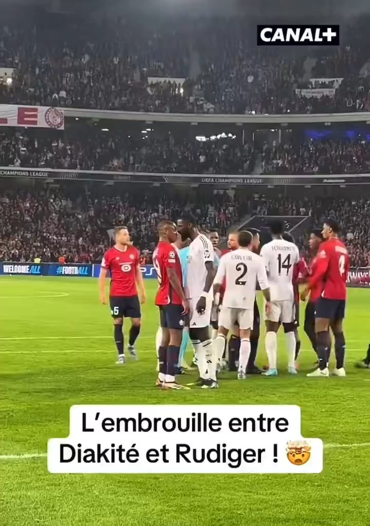 Diakite and Rudiger have some words for each other. Carvajal comes and grabs Diakite by the neck. Referee gives Diakité a yellow card for the action