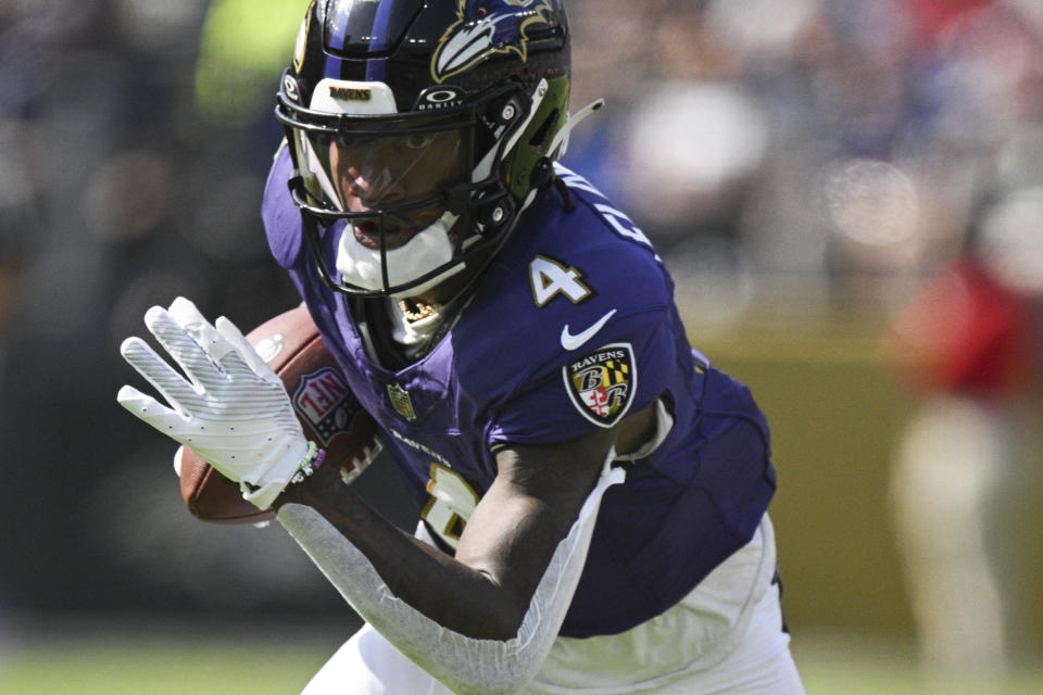 Oct 13, 2024; Baltimore, Maryland, USA; Baltimore Ravens wide receiver Zay Flowers (4) runs after a catch during the first half against the Washington Commanders at M&T Bank Stadium. Mandatory Credit: Tommy Gilligan-Imagn Images