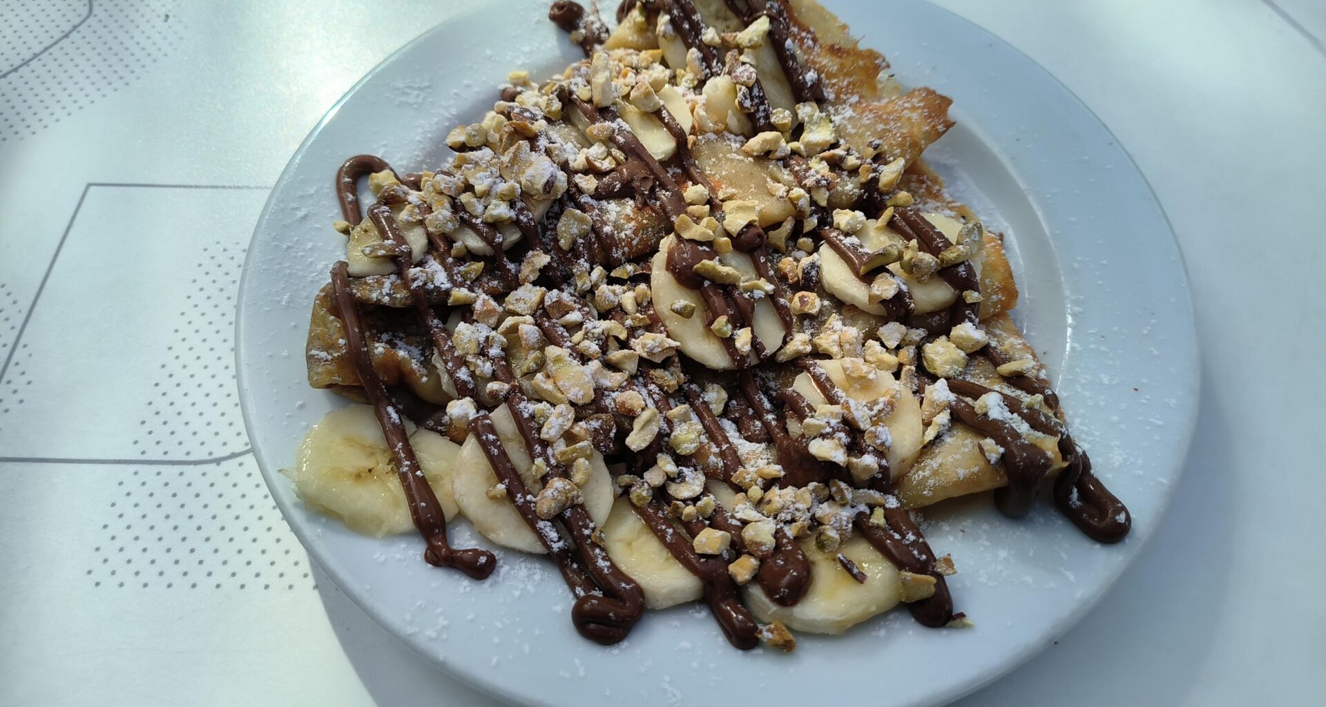 Chocolate Banana and Pistachio on Crêpe in Romeira Market, Almada, Portugal, yesterday.