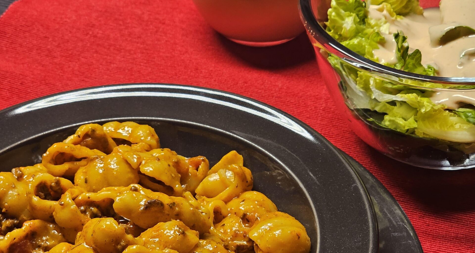 Pasta al ragú with a side salad