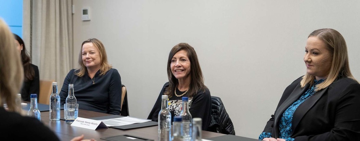 Photo: First Lady Tammy Murphy sitting by the roundtable