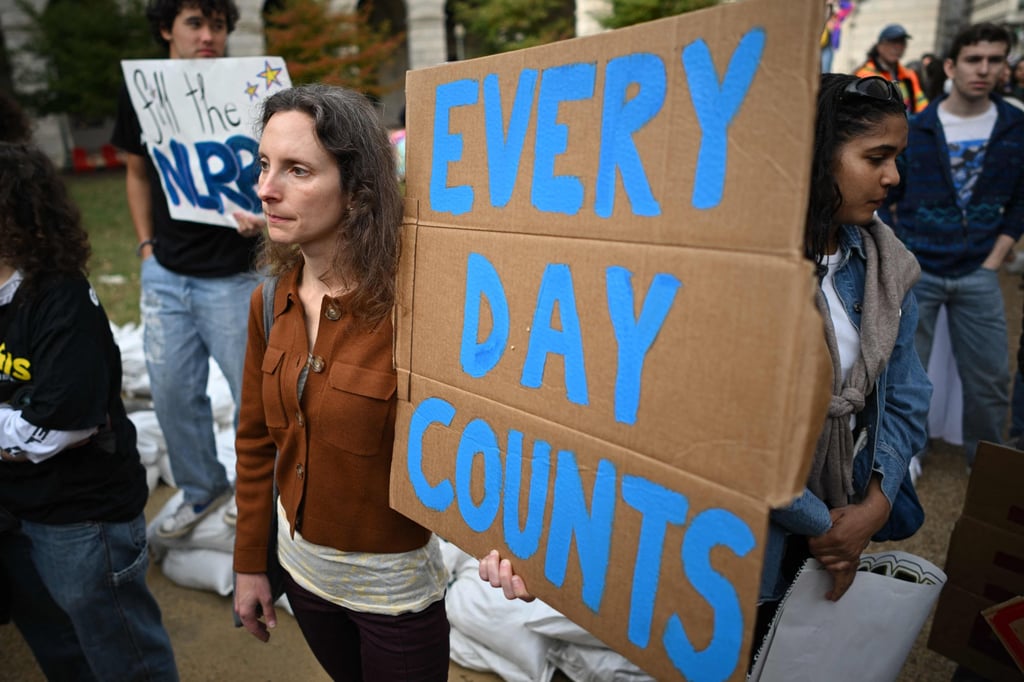 Environmental activists rally to demand climate action before US president-elect Donald Trump takes office, in Washington, on November 17. Photo: AFP Environmental activists rally to demand climate action before US president-elect Donald Trump takes office, in Washington, on November 17. Photo: AFP