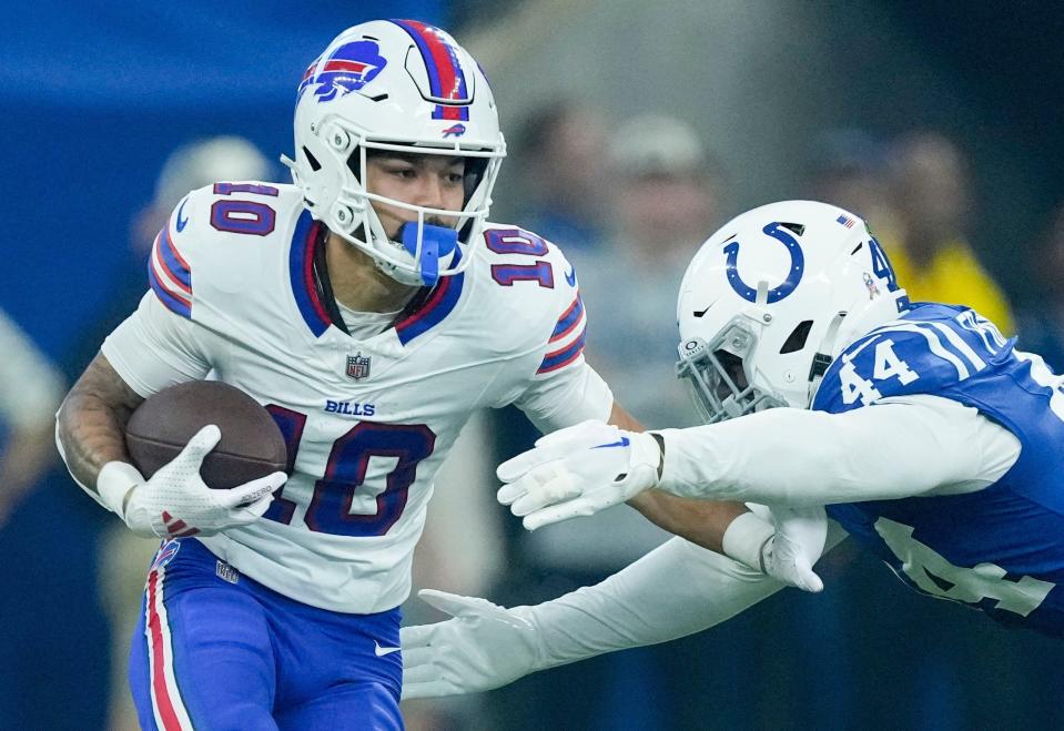 Indianapolis Colts linebacker Zaire Franklin (44) reaches for Buffalo Bills wide receiver Khalil Shakir (10) on Sunday, Nov. 10, 2024, during a game against the Buffalo Bills at Lucas Oil Stadium in Indianapolis.