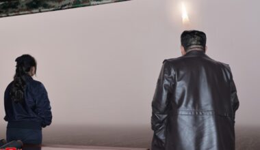 Kim and Daughter Observe Missile Test