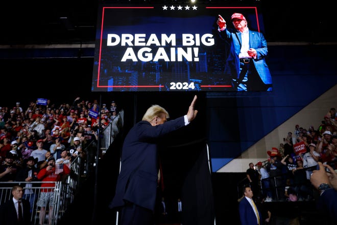 Republican presidential nominee, former President Donald Trump walks off stage at the conclusion of a campaign rally at the Salem Civic Center on November 02, 2024 in Salem, Virginia. With three days until the election, Trump is campaigning for re-election in Virginia, a state that recent polls point to being a 10-point win for Democrats on Election Day.