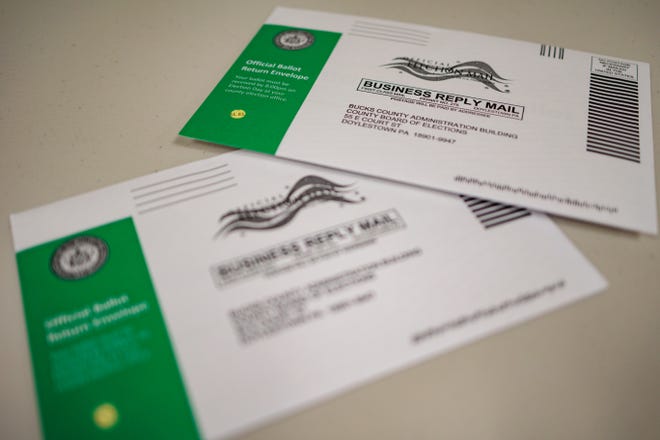 In this photo illustration, mail-in ballots are displayed during a processing demonstration at the Board of Elections office in Doylestown, Pennsylvania.